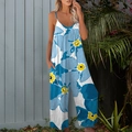 Detail van een blauwe bloemenjumpsuit met wijde pijpen en handige zijzakken - 3XL / Grote Blauwe Bloem