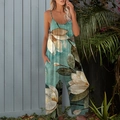 Detailed view of women's green floral wide-leg jumpsuit with v-neck and side pockets - 3XL / Cyan Magnolia
