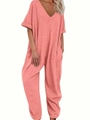 Detailansicht eines korallenrosa Jumpsuits mit V-Ausschnitt und Leinenstruktur - S / Rosa