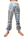 Detailed view of elastic waistband and graphic street style prints on women's joggers - S / Light Gray (World Tour Print)