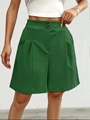 Detail view of high waisted dark green wide leg shorts with double buttons and pleated texture - S / Green