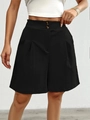 Detail shot of black high-waisted wide-leg shorts featuring vertical texture and double buttons - S / Black