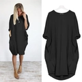 Lässiges schwarzes Oversize-Damenkleid mit langen Ärmeln, Seitentaschen und Saumkurve - S / Schwarz