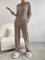 Detail of taupe ribbed knit set featuring V-neck top and high waist wide leg pants - S / Khaki