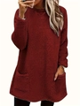 Detail shot of the plush red fleece texture and practical side pockets on this warm sweater - Burgundy