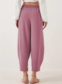 Detail of high waisted wide leg dusty pink trousers with elastic back and fabric texture - Pink Purple