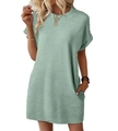Detail of light green summer dress showing textured puckered fabric and side pockets - Light Green