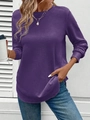Detailed view of dark purple waffle knit fabric on long sleeve crewneck sweatshirt - S / Purple