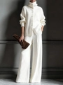 Detailed macro of thick ribbed knit fabric on a stylish cream white women's two-piece set - XS / Top And Bottom / White