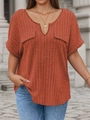 Detail of V-neckline and textured ribbed knit fabric on the loose burnt orange summer top - 1XL / Caramel color