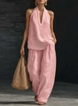 Detail von hellrosa Neckholder-V-Ausschnitt-Top und weiter Hose aus Baumwoll-Leinen-Stoff - Rosa