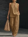 Detail showing the linen fabric texture of a brown v-neck top and wide-leg trousers - S / Top And Bottom / Khaki