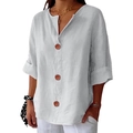 Detail of white cotton linen V-neck top with brown buttons and folded sleeve cuffs - S / White