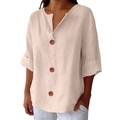 Detail of V-neck cotton linen blouse featuring large brown buttons and natural texture - S / Off White