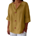 Detail of mustard yellow linen shirt with V-neckline and dark wood buttons - S / Earthy Yellow