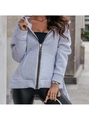 Close-up of a women's grey hoodie featuring a round zipper pull and front split hem - S / Gray