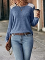 Detalle de blusa de punto acanalado azul marino con encaje blanco en los hombros - S / Azul
