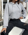 Close-up of grey waffle knit texture on a cropped drawstring hoodie with kangaroo pocket - S / Gray