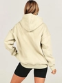 Oversized beige hoodie with drop shoulder and ribbed cuffs shown from the back view - Apricot