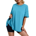 Detail view of the side slits and curved hemline on a loose-fit light blue cotton t-shirt - S / Sky Blue