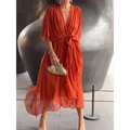 Detail of burnt orange wrap dress with self-tie waist and flowing layered chiffon hem - Orange Red