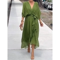 Detail of green V-neck dress with tie waist and elegant irregular ruffled hemline - Green