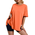 Detail view of the side slit and hem on a bright orange oversized cotton T-shirt - S / Tops / Orange
