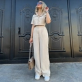 Completo beige due pezzi da donna con camicia a maniche corte e pantaloni a gamba larga - S / Albicocca