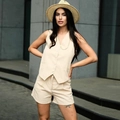 Women's 2-piece beige suit set featuring a sleeveless vest and high waist shorts - S / Apricot