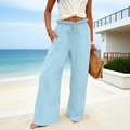 Detail of light blue linen wide leg pants featuring high smocked waist and drawstring ties - S / Light Blue