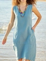 Close-up of light blue cotton linen dress with V-neck, large pockets, and coastal vibe - S / Light Blue