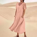 Detail of loose salmon cotton linen dress with round neck and large pockets in desert - S / Tops / Pink