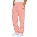 Men's casual pink joggers featuring an elastic drawstring waist and orange logo patch - Pink