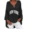 Detail of black V-neck top with New York print and asymmetrical high-low hem design - S / Top (NEW YORK Print 1260X) / Black