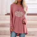 Detailed view of women Halloween gothic t-shirt featuring leopard print pumpkin pattern - S / Tops / Leopard Pumpkin (Rose Pink 126Z)