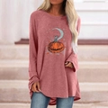 Detail of Halloween pumpkin and moon print on oversized mauve long sleeve shirt - S / Tops / Pumpkin Moon Star (Rose Pink)