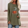 Detailed view of Halloween pumpkin print on oversized army green long sleeve shirt - S / Tops / Pumpkin Moon Star (Khaki)