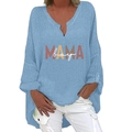 Detail of light blue cotton linen shirt with V-neck and MAMA boy graphic print - S / Tops / Sky Blue MAMA Print (1268X)
