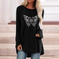 Detailed macro view of the gothic butterfly skull print on this loose black long sleeve tee - S / Tops / Black (1221X)