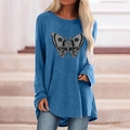 Detail of blue long-sleeve tee featuring creative moth and skull print on cotton fabric - S / Tops / Butterfly Skull (Blue)