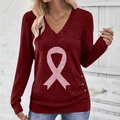 Women's V-neck long sleeve top in burgundy featuring a pink ribbon print and button detail - S / Burgundy