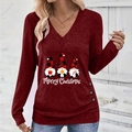 Detail of Christmas gnomes print and side buttons on elegant V-neck long sleeve top - S / Burgundy