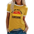 Detail of sunshine palm tree print on a yellow retro ringer t-shirt with white trim - Yellow