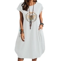 Detailed view of bee and daisy floral print on white cotton linen pocket dress - White