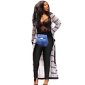 Detail of ankle-length white cardigan with black diamond pattern and blue fringe waist bag - S / White