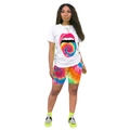 Detail of printed white T-shirt and colorful tie-dye cycling shorts set for women - S / Orange Tongue Style
