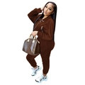Detail of coffee velvet tracksuit set featuring dual zippers and functional pockets - S / Coffee