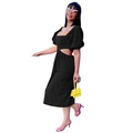 Detailed view of women's black dress featuring trendy cut-out waist and puff sleeves - S / Black