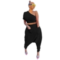 Detail of black one-shoulder top and harem pants with large functional pockets - S / Black