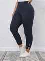 Leggings elasticizzati a vita alta da donna con esclusivi fiori intagliati alle caviglie - Taglia S / Pantaloni e gonne / Nero